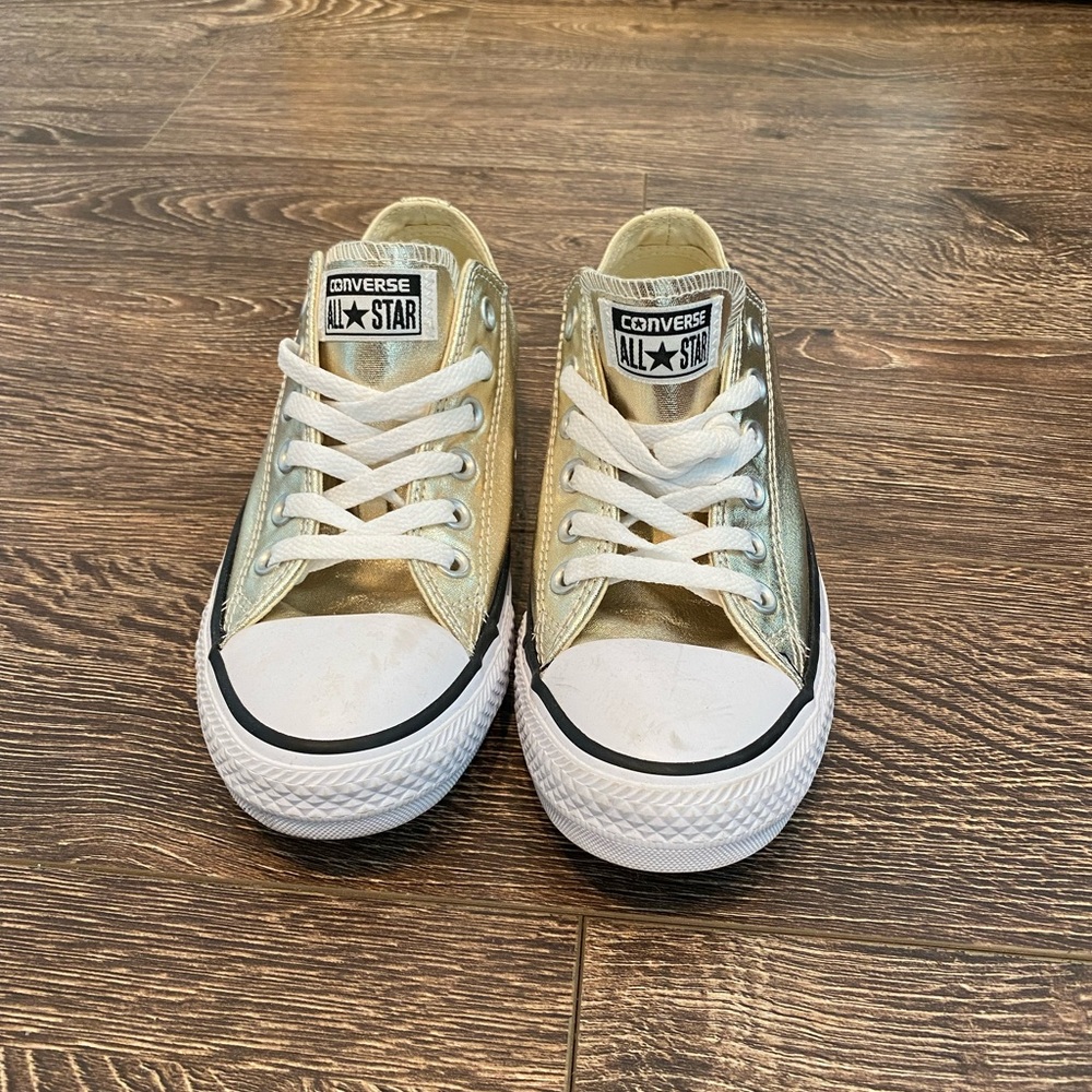Metallic gold low top converse